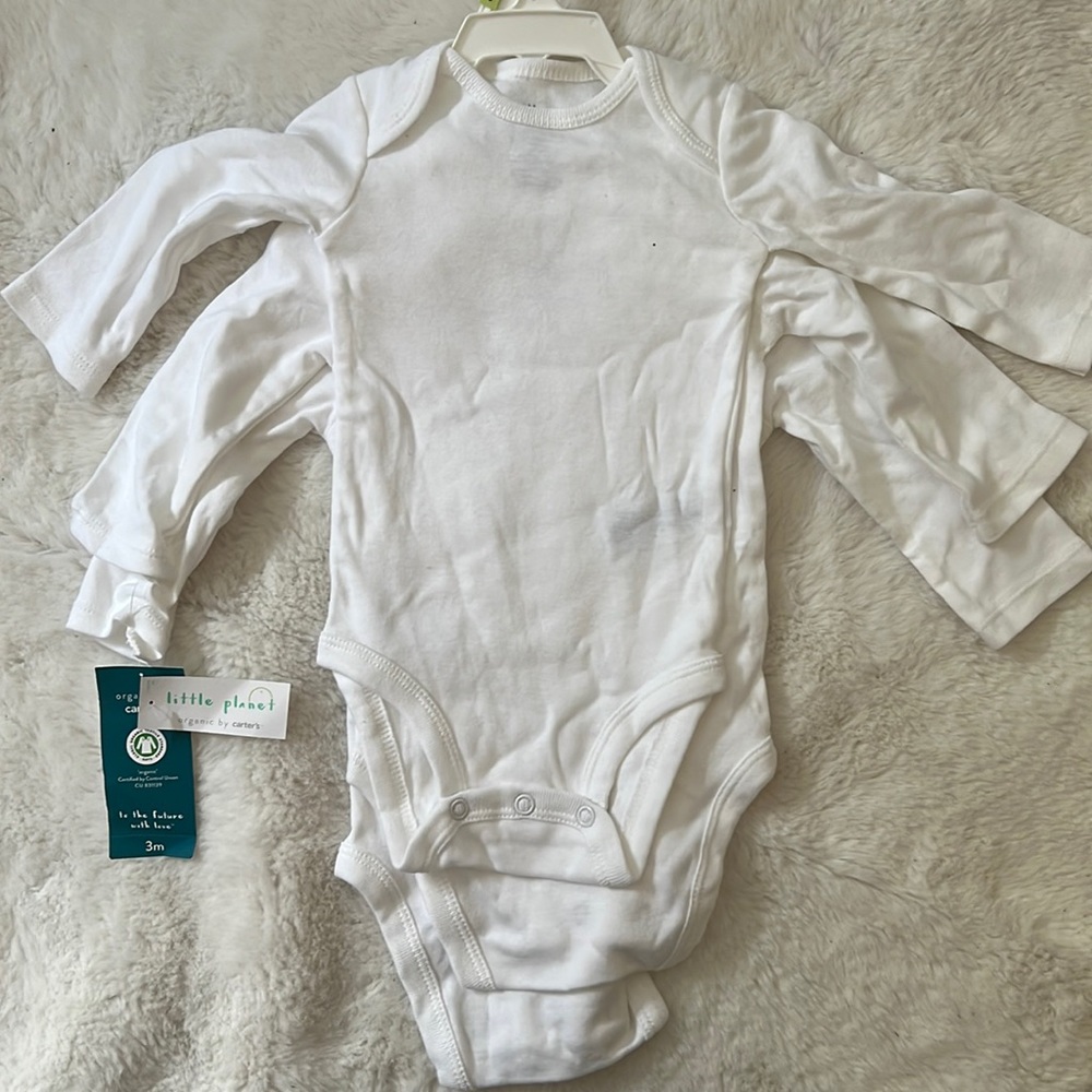 NWT Little Planet by Carters 3 pack long sleeve onesies, size 3m